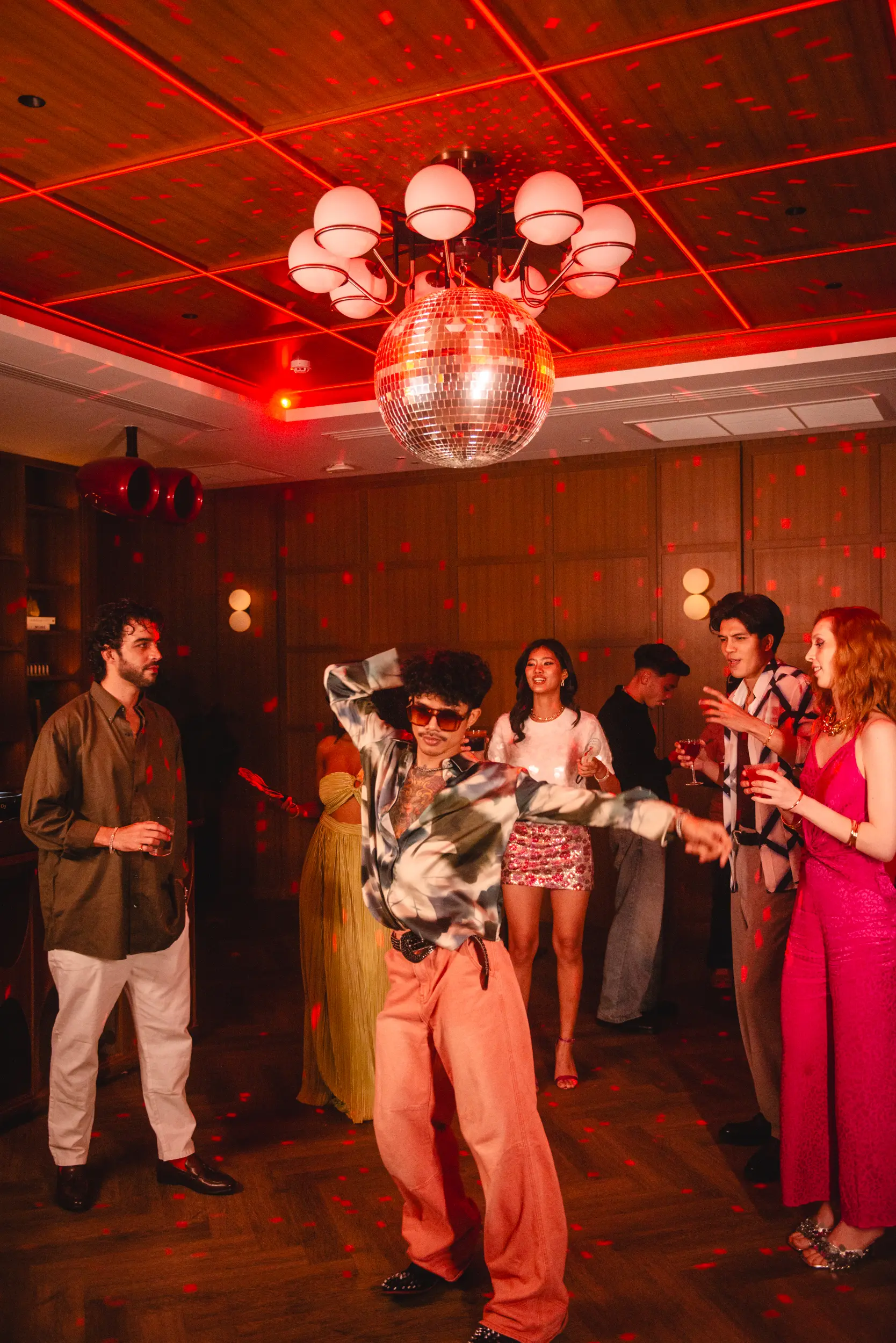 APT 101 Bangkok — packed dancefloor under the disco ball, Sukhumvit 17 penthouse